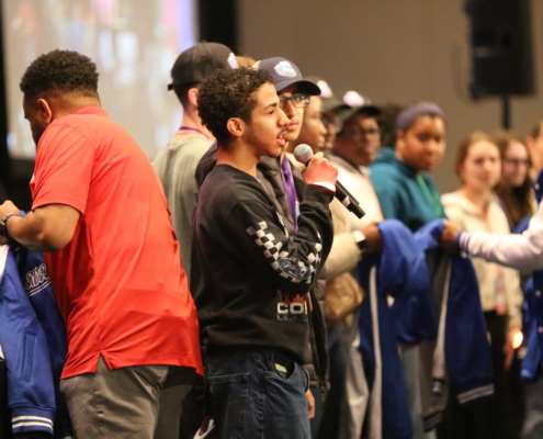 Regional Youth Advisory Committee receiving their letterman jackets at Teen Summit 2026