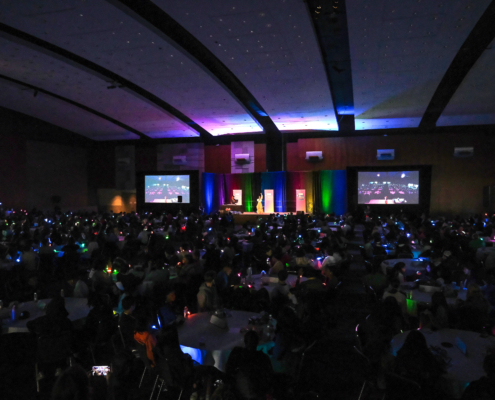 Light up bracelets at Teen Summit 2026