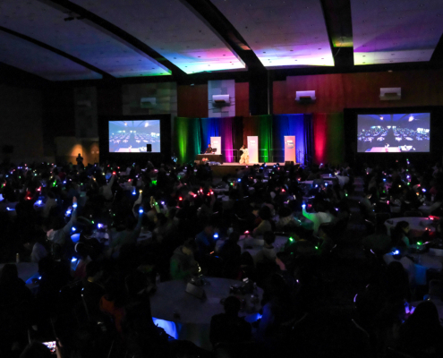 Light up bracelets at Teen Summit 2026