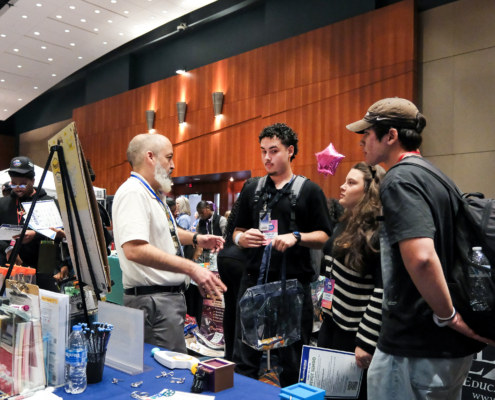 Students at the Teen Summit vendor fair