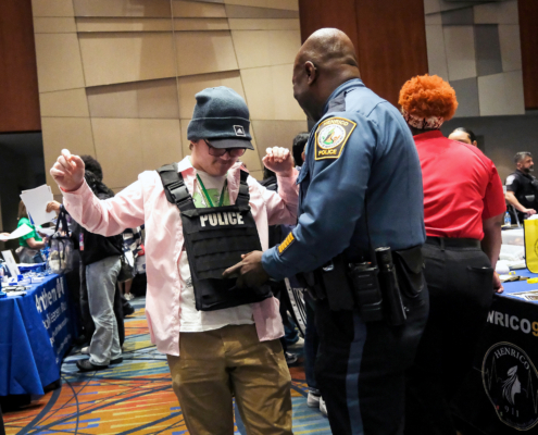 Students at the Teen Summit vendor fair